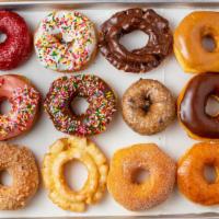 Dozen Assorted Round Donuts (Raised & Cake) · 12 Round Donuts Assorted Dozen.
Specialty Donuts are not included.
