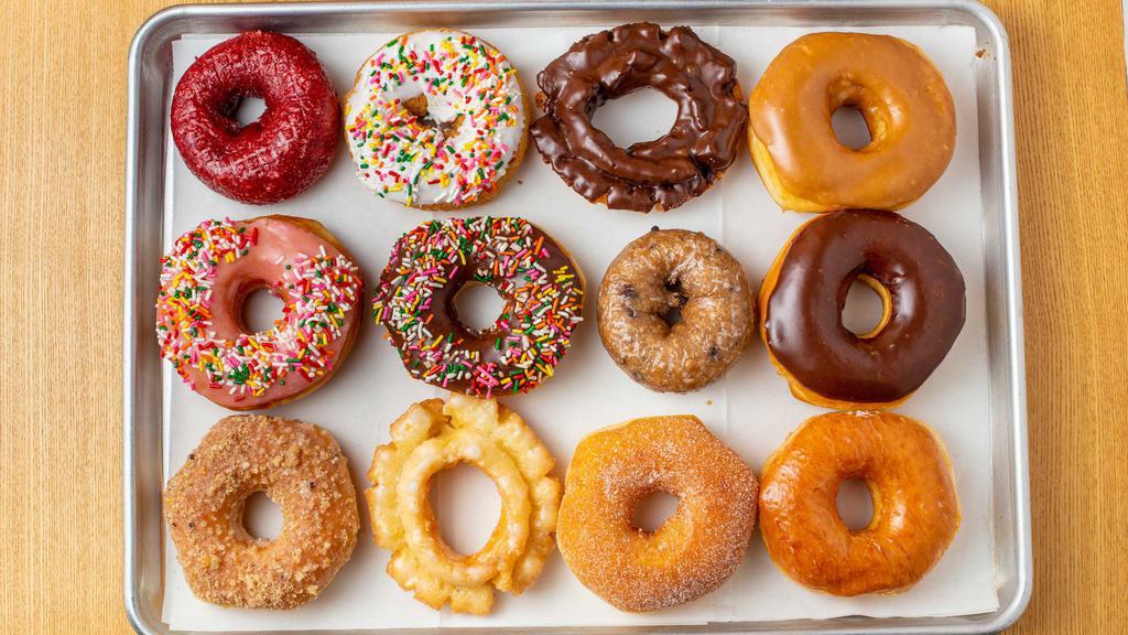 Dozen Assorted Round Donuts (Raised & Cake) · 12 Round Donuts Assorted Dozen.
Specialty Donuts are not included.