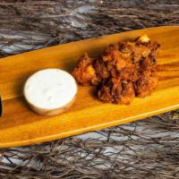 Texas Holdem Bbq Wings · Our famous wings fried until perfectly golden. Tossed in house made bbq sauce, served with y...
