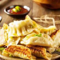Pot Sticker · Delicious chicken and vegetable dumplings crispy-fried paired with special ginger soy sauce.