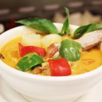 Roast Duck Curry · Special Red curry,  coconut milk with Roast Duck Meat, pineapple, tomato, bell and fresh Tha...