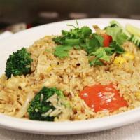 Thai F/R · Stir-fried Jasmine rice with egg, tomatoes, onion, and broccoli, sprinkled with cilantro.