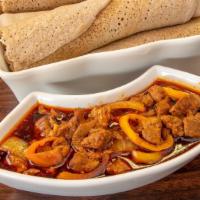 Red Tibs Chicken · Spicy. A spicy sautée of chicken, onion, and exotic spices.