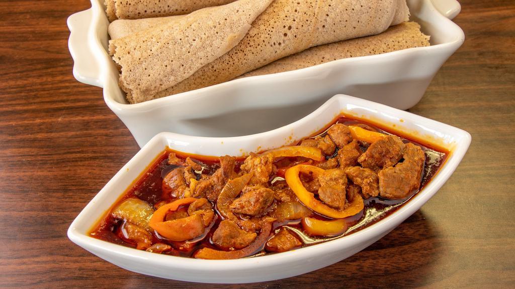 Red Tibs Chicken · Spicy. A spicy sautée of chicken, onion, and exotic spices.