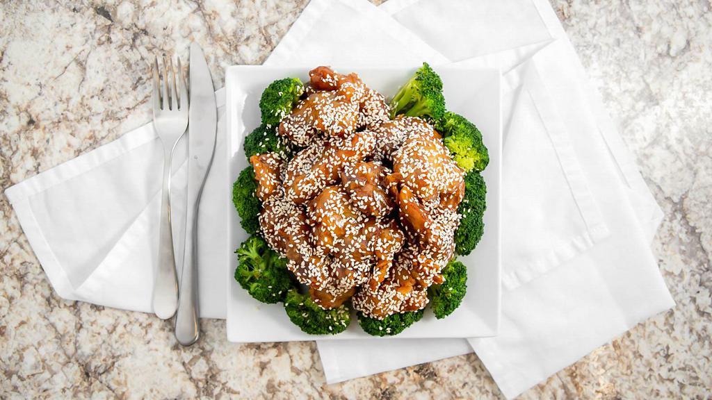 Sesame Chicken · Sesame chicken served with fresh broccoli.