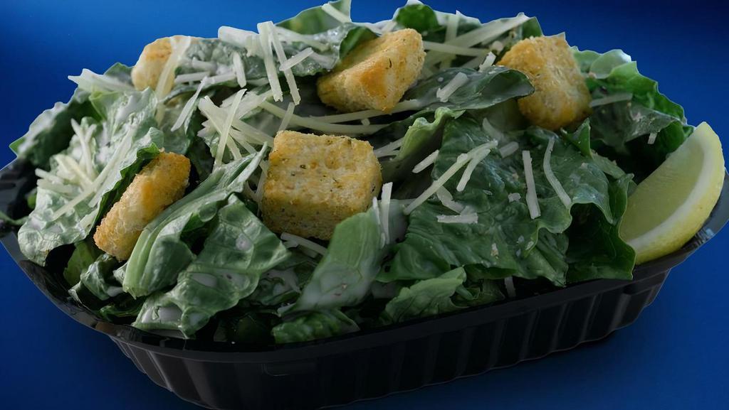 Side Caesar Salad · Caesar Salad with croutons, parmesan cheese and Caesar dressing.