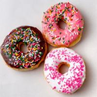 Sprinkle Donut · Sprinkles on Frosting of Chocolate, White Vanilla or Pink Strawberry