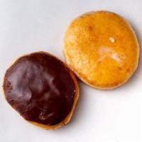 Round Donut · Choice of filling, bavarian cream, raspberry, lemon, cherry, sweet cream cheese.