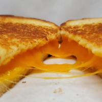 Kids Grilled Cheese · Grilled cheese sandwich on your choice of white or wheat bread