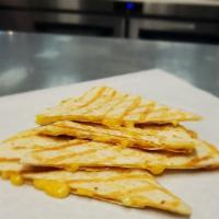 Kids Cheese Quesadilla · Cheddar jack cheese in a panini'd flour tortilla