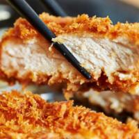 Pork Katsu · Pounded pork cutlet with a panko crumb coating, fried until super crunchy on the outside and...