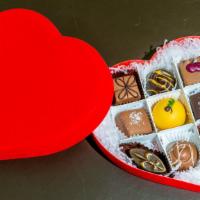  Special Heart Chocolate Box 9Pc · Offers 9 Pieces 
special seasonal truffles add in the box