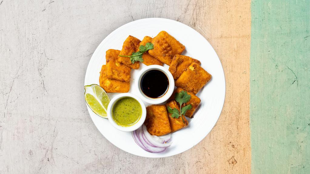Vegetable Pakoras · A popular Indian street food! Fresh vegetables, coated in spiced gram flour and deep fried.