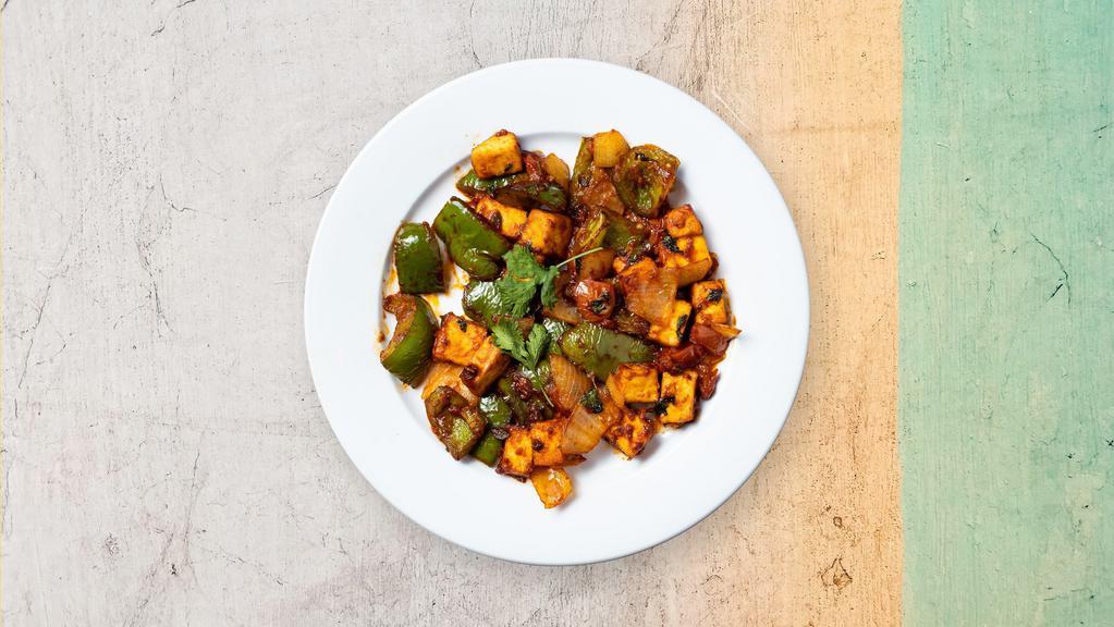 Chili Paneer · Homemade Paneer cheese cooked with dry chili and bell peppers.