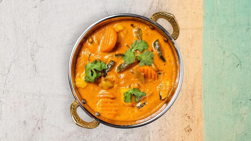 Korma Entree · Ginger, garlic, potato and carrot in a mild cream and yogurt sauce. Served with rice.