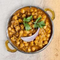 Chana Masala · Garbanzo beans with ginger in a Specially spiced sauce. Served with rice.