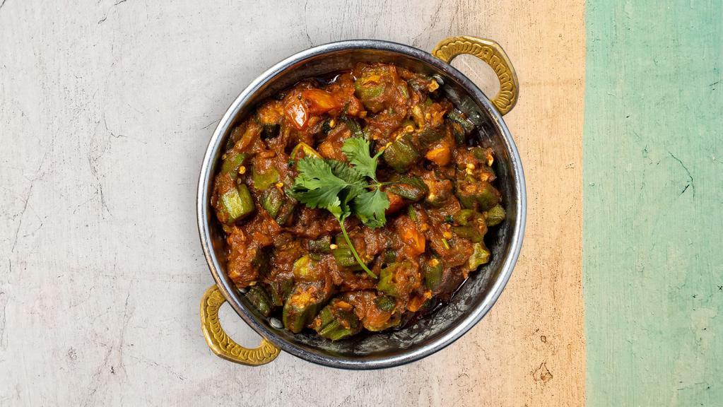 Bhindi Masala · Fresh okra with sliced onions, herbs and mild spices. Served with rice.