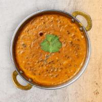 Daal Maharani · Split lentils cooked to a thick soup with herbs and spices. Served with rice.