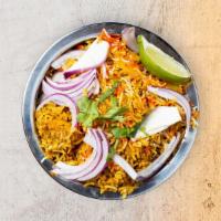 Vegetable Biryani · Aromatic basmati rice with garden fresh vegetable cooked with herbs, spices and seasonings.