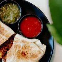 Silvia'S Famous Breakfast Burrito · Choose from pork shoulder, ground beef or potato with spinach, with four cheese blend and sa...