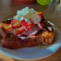 Rebel French Toast · The best bread makes the best french toast - ours is made with a fresh challah loaf from Reb...