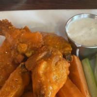 Chicken Wings · Jumbo wings with choice of house made buffalo or cider bbq. Carrots & celery