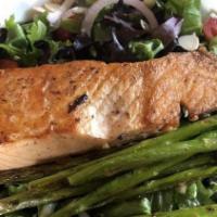 Salmon & Asparagus Sald · Mixed greens topped with to order seared salmon, grilled asparagus, heirloom tomato, red oni...