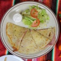 Quesadillas · Served with salad.