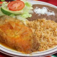 Chile Relleno · Served with rice beans and tortillas.