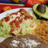 Tacos Dorados · 3 Rolled Tacos (chicken or shredded Beef) with rice and beans.