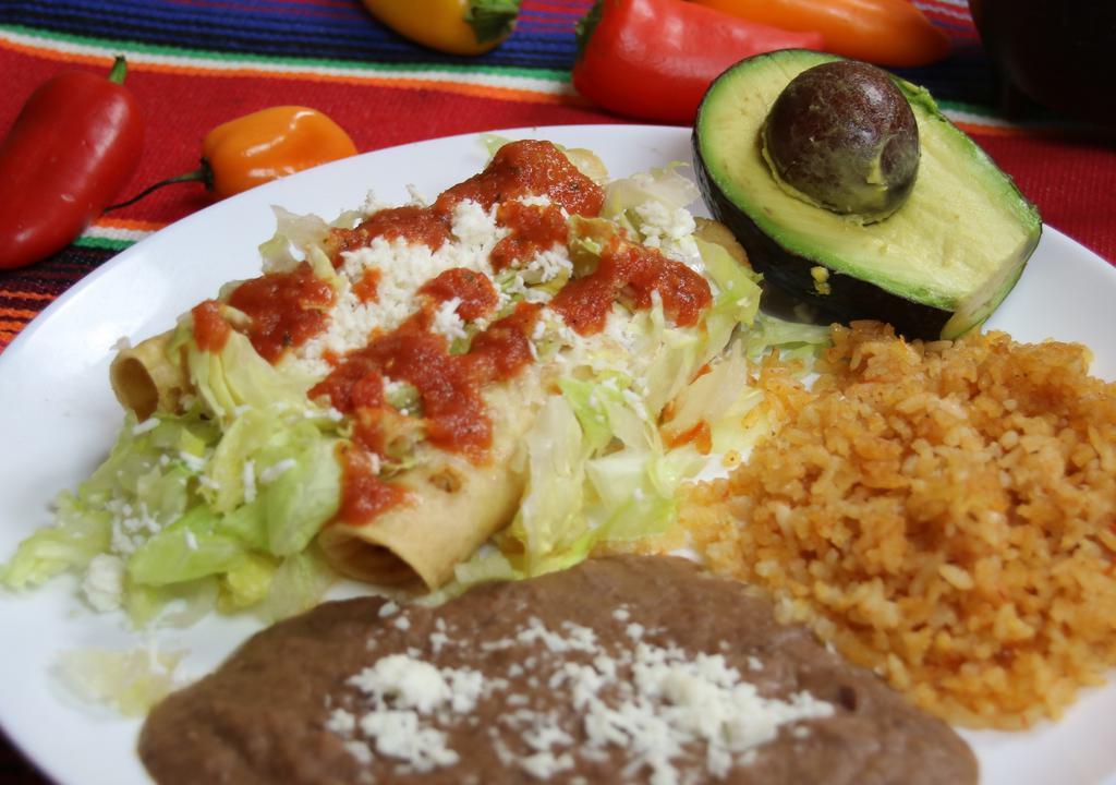 Tacos Dorados · 3 Rolled Tacos (chicken or shredded Beef) with rice and beans.