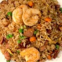 House Fried Rice · BBQ chicken, spam, shrimp,, rice, green onion, carrot, pea, egg.
