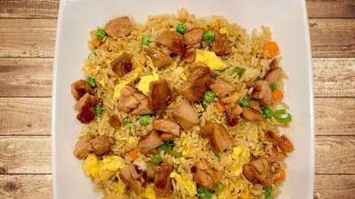 Bbq Chicken Fried Rice · BBQ chicken, rice, green onion, carrot, pea, egg.