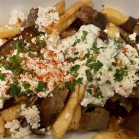 Loaded Gyro Fries · Gyro meat (beef and lamb), tzatziki sauce, parsley and feta cheese.