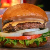Classic Burly Burger · Classic American burger with lettuce, tomato, onions, and Burly sauce (like fry sauce) on a ...