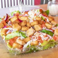 House Salad · Romaine lettuce, tomatoes, croutons, pepperoni, onions and mozzarella cheese.