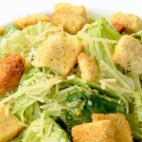 Caesar Salad · Romaine lettuce, shredded parmesan cheese and croutons, tossed in creamy caesar dressing.