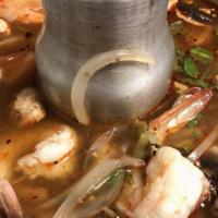 Tom Yum · Hot...Have fun. Spicy and sour soup with lemongrass, mushrooms, chili and scallions with chi...