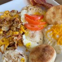 3 Egg Breakfast · Includes three eggs, protein, country grits or hash brown, toast or biscuits.