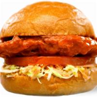 The Buffalo · Crispy chicken tossed in buffalo sauce, tomato, blue cheese coleslaw