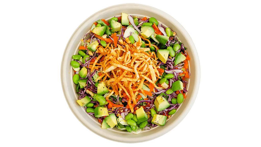 Asian Salad · Romaine, red cabbage, cucumber, cilantro, carrot, broccoli, avocado, edamame, peanuts, wonton strips, sweet chili vinaigrette