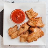 Rocky Mountain Oysters · Locally produced Rocky Mountain Oysters coated in traditional cornmeal breading and served w...