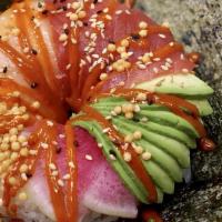 Sushi Donut · Rice donut with salmon, fish eggs, cucumber, crab meat avocado, sesame seed.