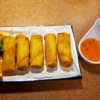 Thai Spring Rolls · Deep fried spring roll stuffed with mixed vegetables and bean thread noodles, served with sw...