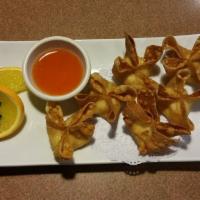 Cream Cheese Wonton · Crispy wonton filled with cream cheese and deep fried, served with sweet & sour sauce.