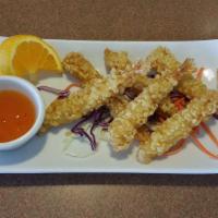 Shrimp Tempura · Breaded battered shrimp and deep fried. Served with sweet and sour sauce.