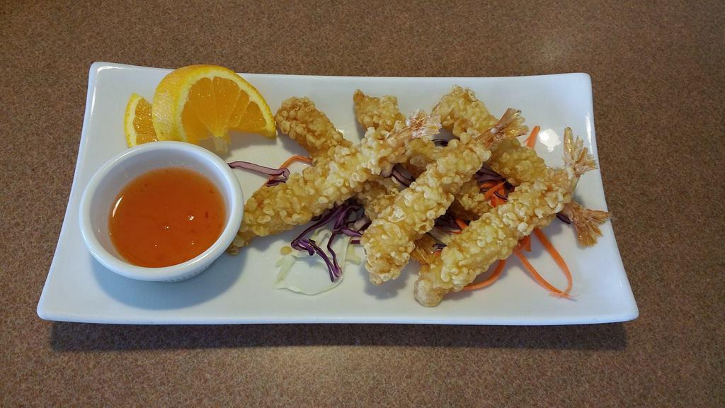 Shrimp Tempura · Breaded battered shrimp and deep fried. Served with sweet and sour sauce.