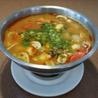 Tom Yum (Large) · Hot and sour clear soup with a touch of fresh lime juice, lemongrass, kaffir lime leaves, to...