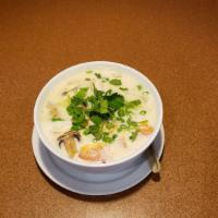 Tom Kha (Small) · Hot and sour creamy Thai coconut milk soup with a touch of lime juice, lemongrass, galangal ...