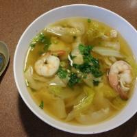 Wonton Soup · Wonton skin stuffed with ground chicken, topped with shrimp and chicken napa cabbage in clea...